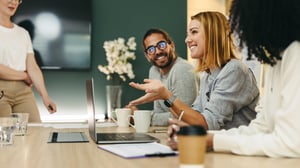 editorial-1436951314-business-woman-talking-to-her-colleagues-during-a-meeting-in-a-boardroom-2880x1620px